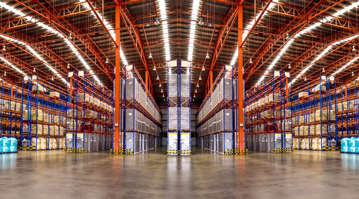 Warehouse industrial and logistics companies. Commercial warehouse. Huge distribution warehouse with high shelves. buying a warehouse
